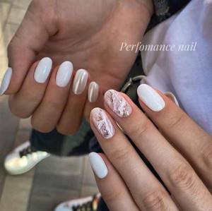 Beige and white manicure with glitter