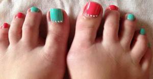turquoise and red pedicure