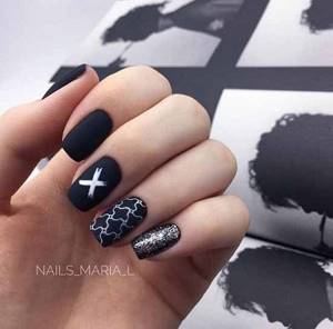 Black manicure with glitter
