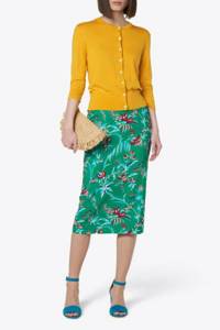 color combination of green skirt and mustard sweater