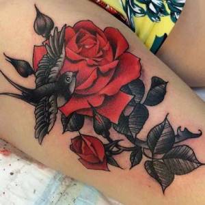 flowers on thigh tattoo photo