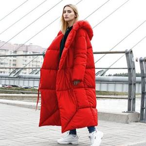 girl in a long red down jacket