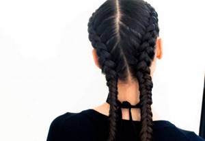 Two tight French braids