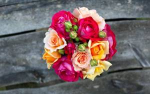photo of a bouquet of multi-colored roses