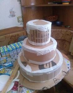 Cardboard base for the cake.