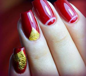 Red and gold manicure with foil