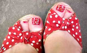 red pedicure with dots