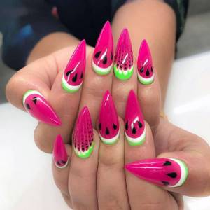 Summer manicure with watermelons on sharp extended nails