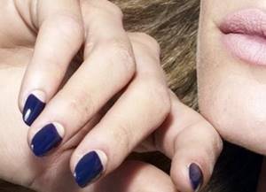 Lunar manicure with blue polish