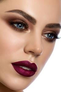 makeup with wine lipstick and bronze shadows