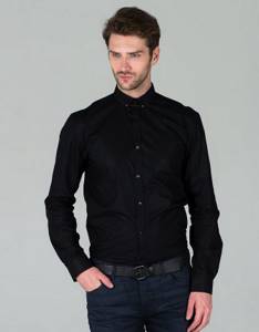 man in a black shirt and jeans