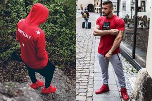 Men&#39;s red sneakers with sports themed items
