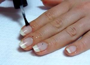 Applying oil to nails