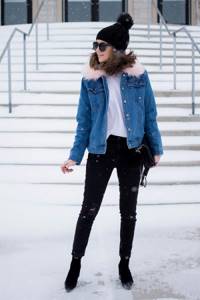 winter look with a black pompom hat, jacket and black jeans