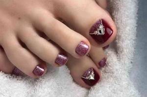 red pedicure with pearls