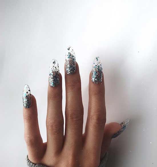 Transparent manicure with glitter