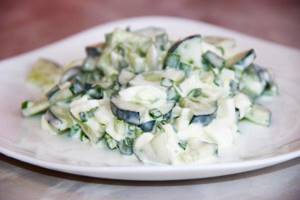 Salad with cucumbers, eggs and mozzarella