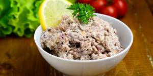 Salad with canned fish, rice, egg and onion