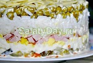 Salad with ham and cheese and cucumbers “Bride”