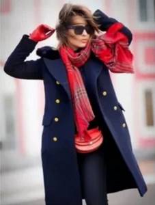 blue coat and red checkered scarf