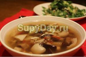 Pork soup with champignons and peas