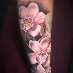flower tattoo on hand
