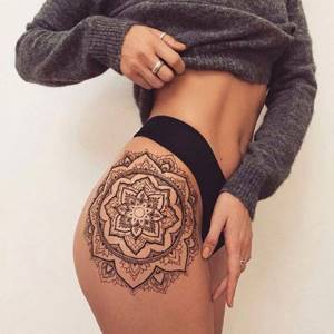 mandala tattoo on thigh