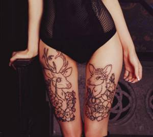 animal thigh tattoo