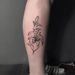 flowers tattoo on leg