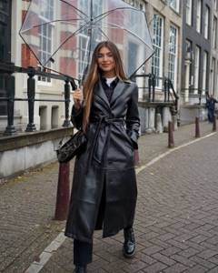 Trendy women&#39;s raincoat 2021-2022. Current news. Fashion models 