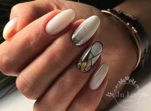 Golden manicure photo on long nails